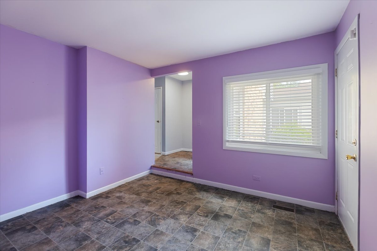 246 Monroe Road Bolingbrook, IL 60440 - Photo 4 of 32 a view of empty room with window