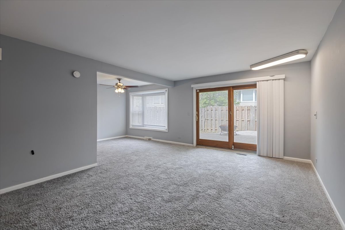 246 Monroe Road Bolingbrook, IL 60440 - Photo 7 of 32 a view of an empty room with a window