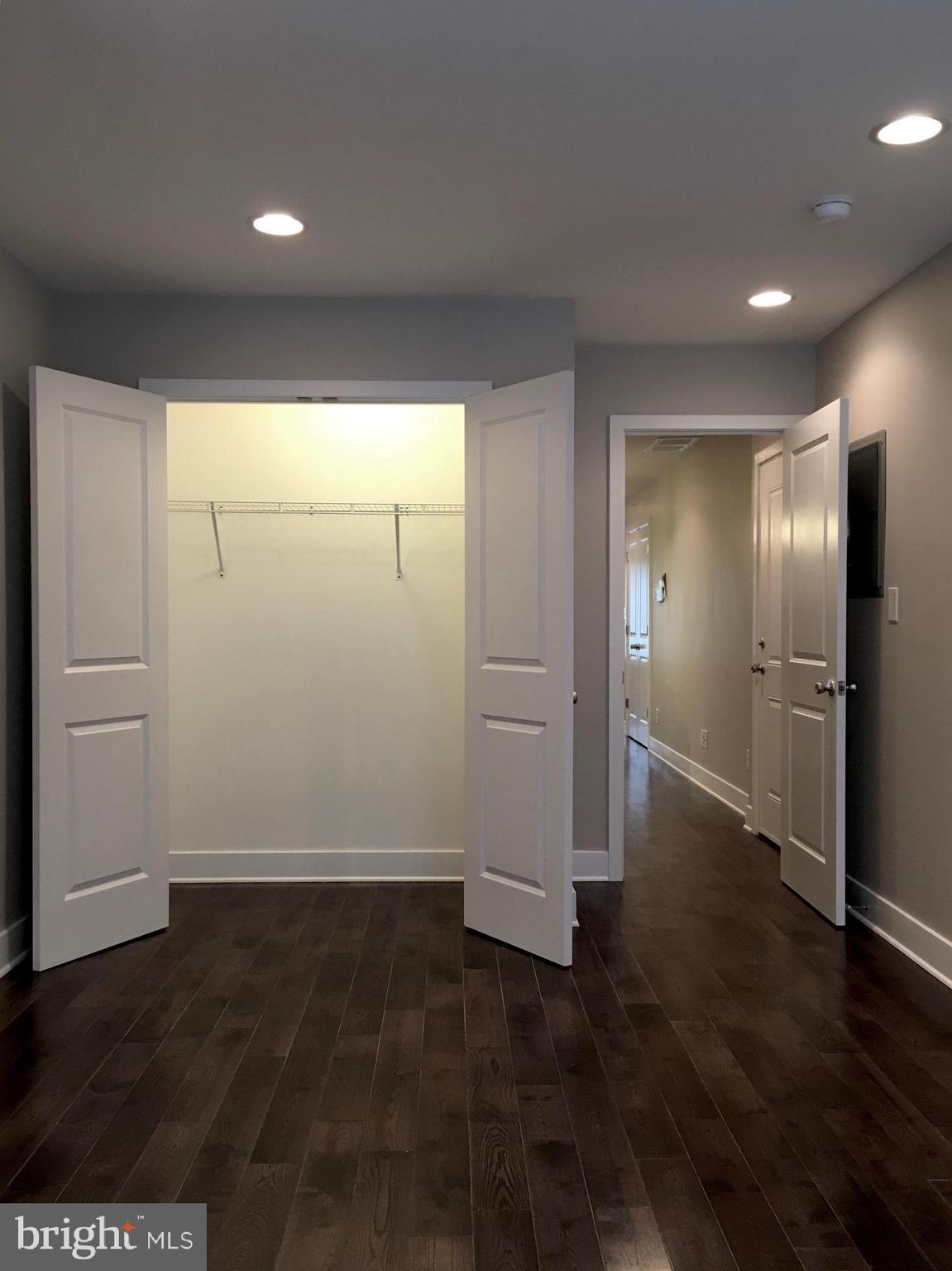 2341 West Thompson Street, Unit C Philadelphia, PA 19121 - Photo 6 of 13 a view of empty room with wooden floor
