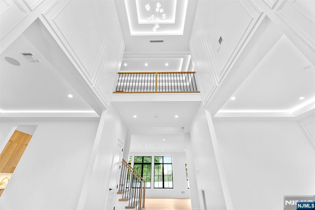 156 Stuart Street Paramus, NJ 07652 - Photo 17 of 47 a view of entryway with wooden floor