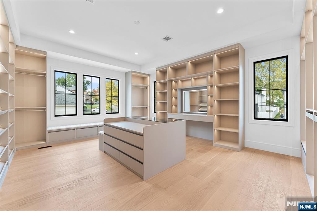 156 Stuart Street Paramus, NJ 07652 - Photo 29 of 47 a living room with furniture and large windows