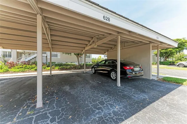 an aerial view of a house with a garden