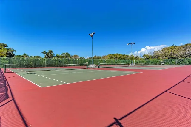 a kitchen with stainless steel appliances granite countertop a stove and a microwave
