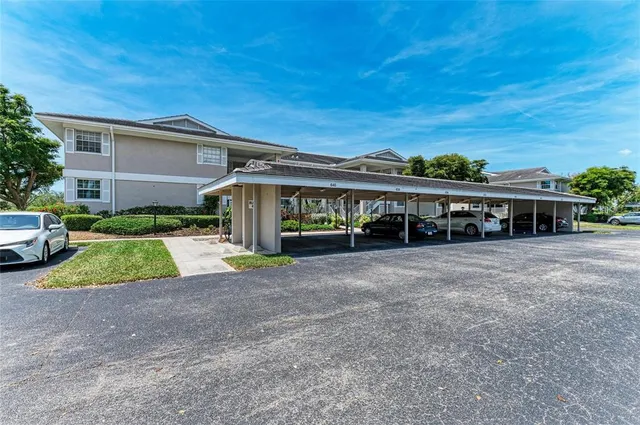 a view of a pathway both side of the house