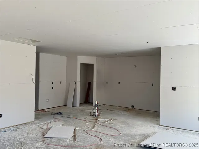 a view of a livingroom with wooden floor