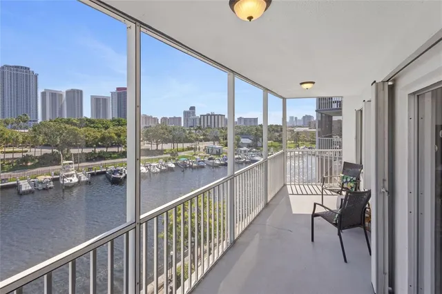 a view of balcony with furniture
