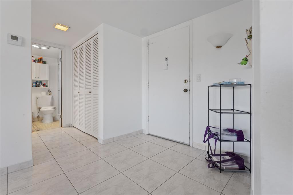 200 Diplomat Parkway, Unit 520 Hallandale Beach, FL 33009 - Photo 8 of 17 a view of an empty room