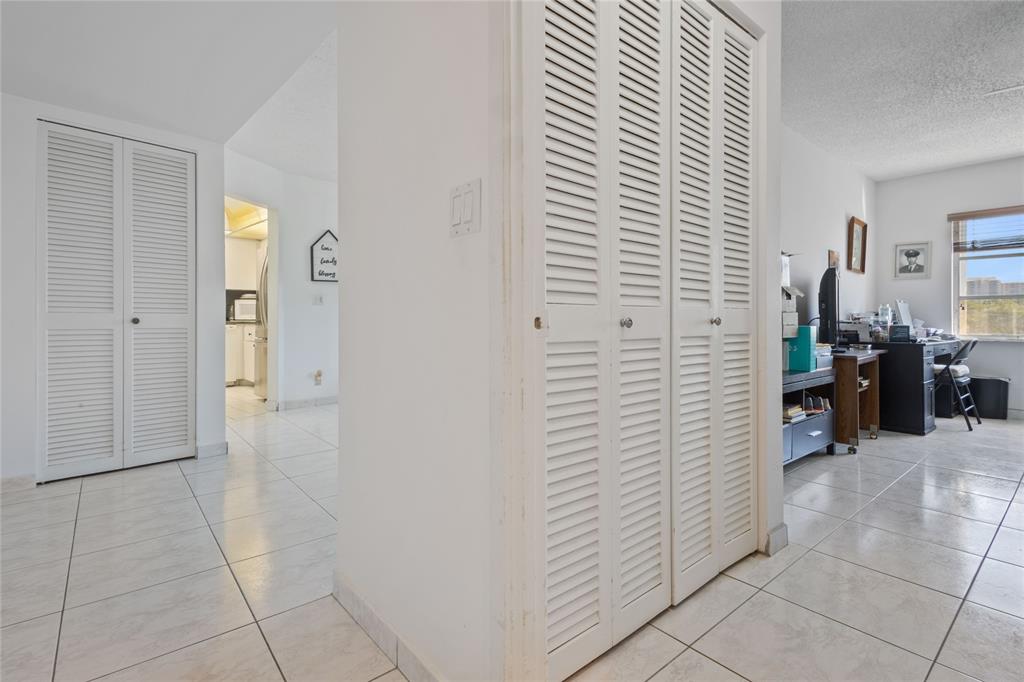 200 Diplomat Parkway, Unit 520 Hallandale Beach, FL 33009 - Photo 9 of 17 a view of hallway with livingroom