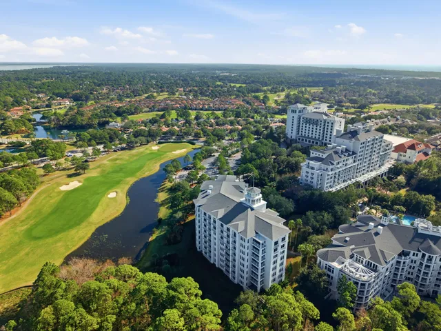 a view of a city with a lake