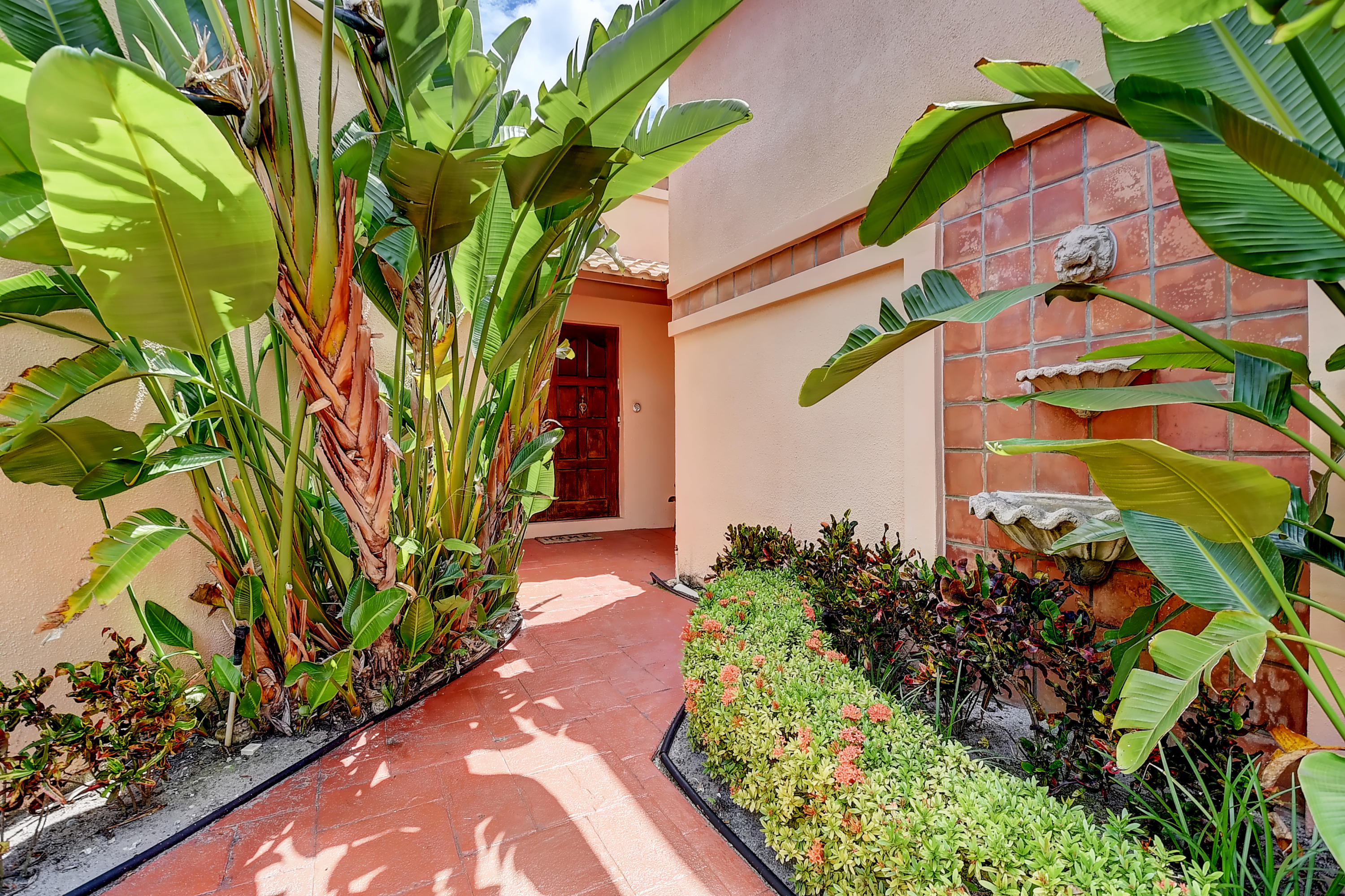 6549 Via Rosa Boca Raton, FL 33433 - Photo 3 of 43 Lush Landscape Walkway