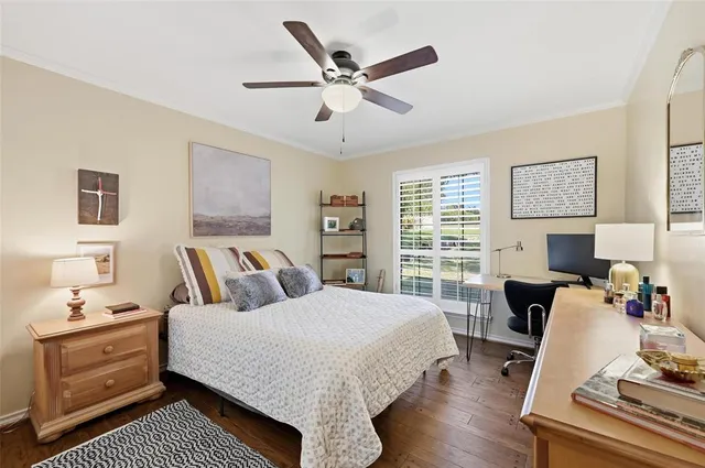 a bed room with a bed and a window