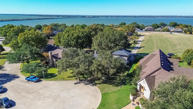 an aerial view of a houses with outdoor space