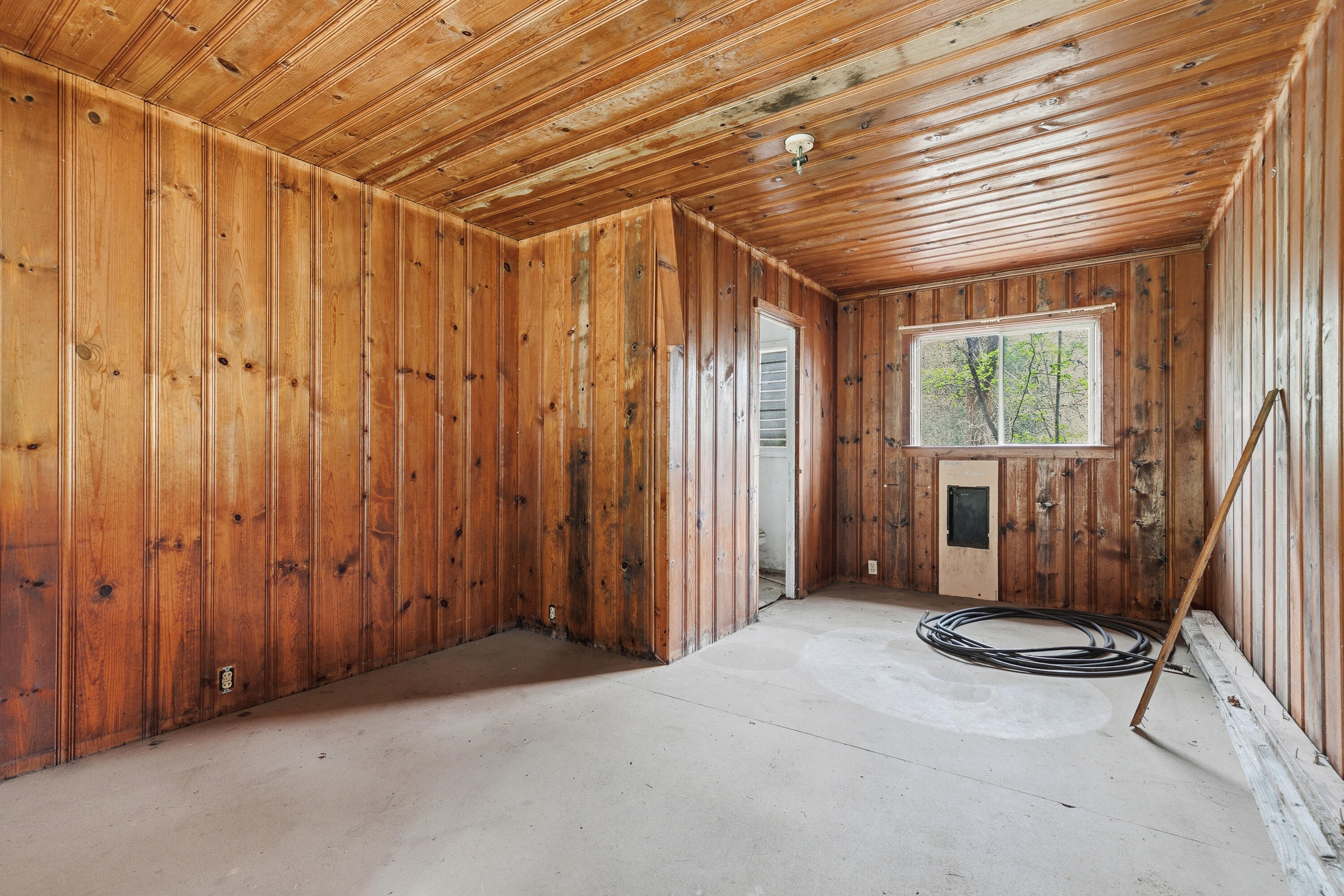 159 Bloom Road Wolf Creek, OR 97497 - Photo 16 of 38 a view of a room with large windows