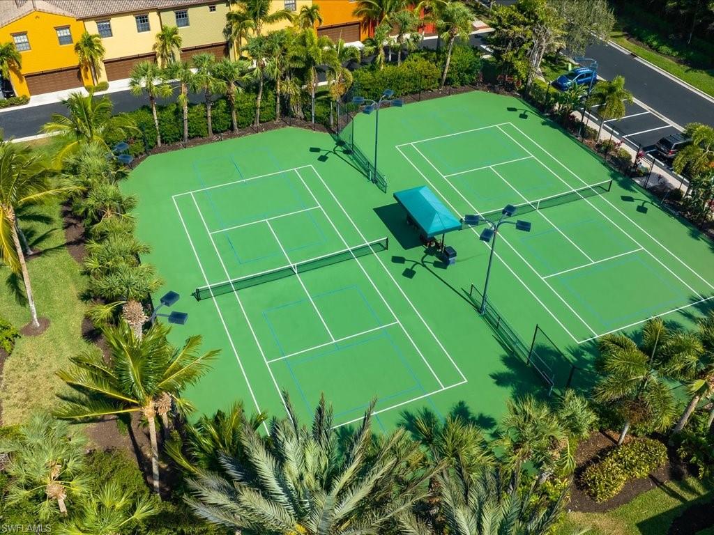 8985 Cambria Circle, Unit 215 Naples, FL 34113 - Photo 36 of 36 a view of a tennis court