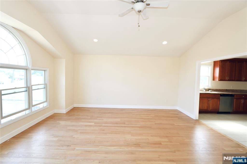 23 Main Avenue Wallington, NJ 07057 - Photo 8 of 29 a view of room with window and wooden floor