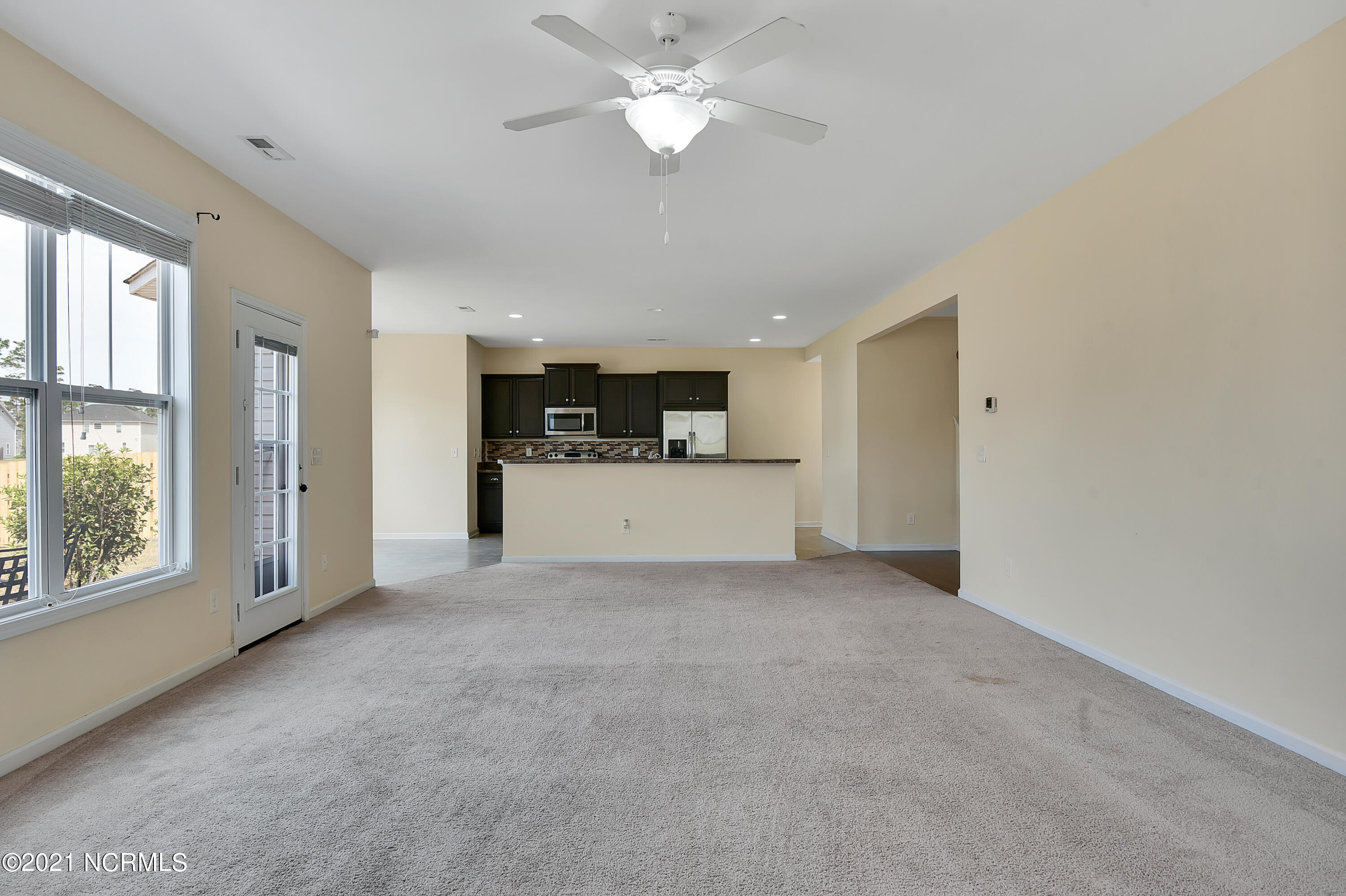 7056 Trailhead Road Leland, NC 28451 - Photo 31 of 35 Living Room. Open floor plan: near Kitchen