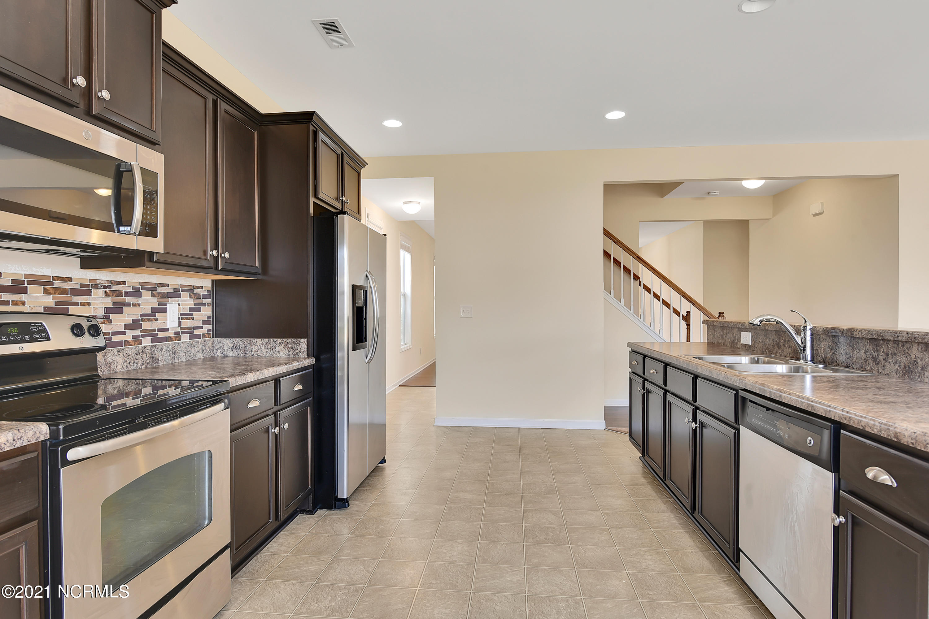 7056 Trailhead Road Leland, NC 28451 - Photo 33 of 35 Open floor plan: Kitchen area