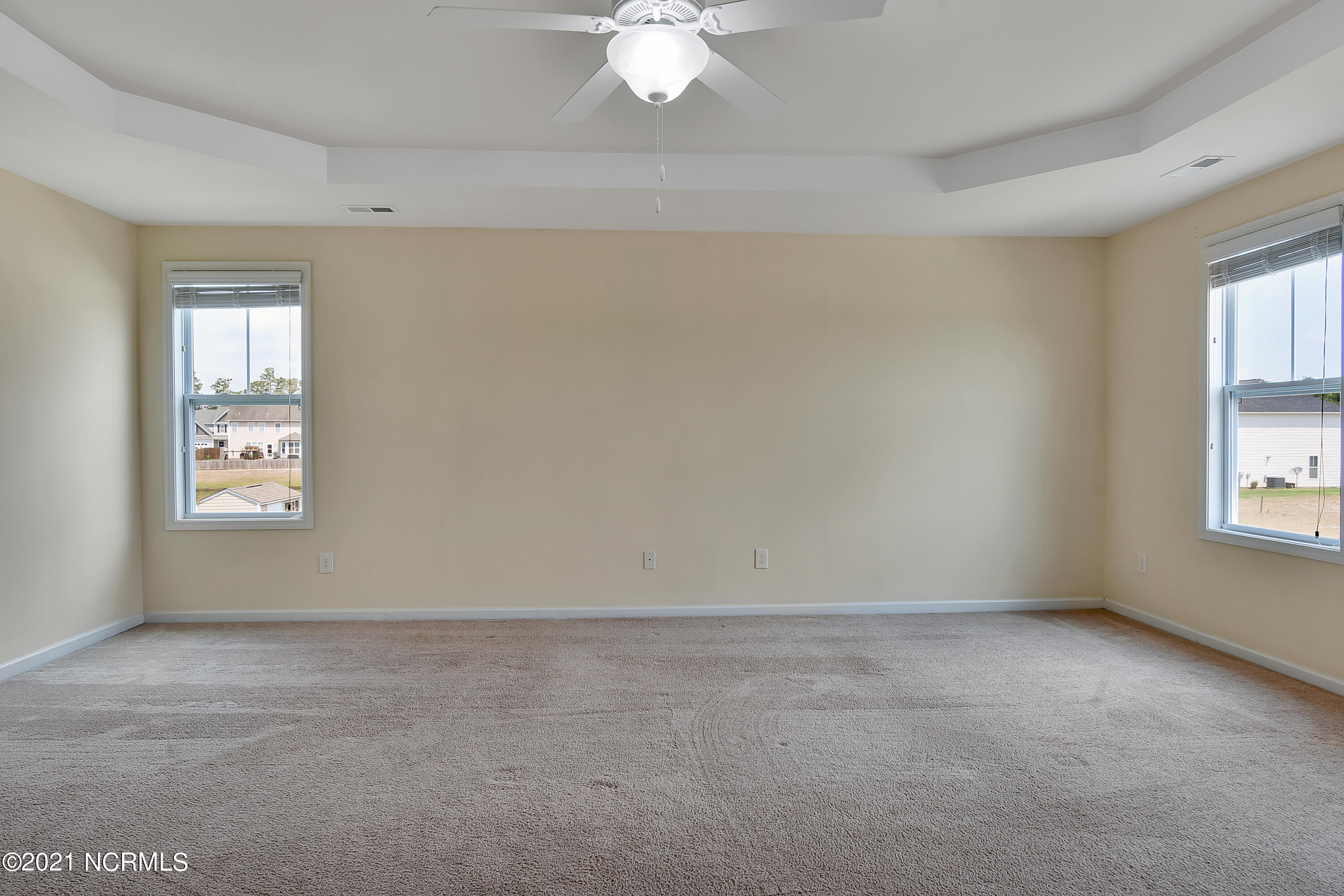 7056 Trailhead Road Leland, NC 28451 - Photo 25 of 35 Master Bedroom with trey ceiling