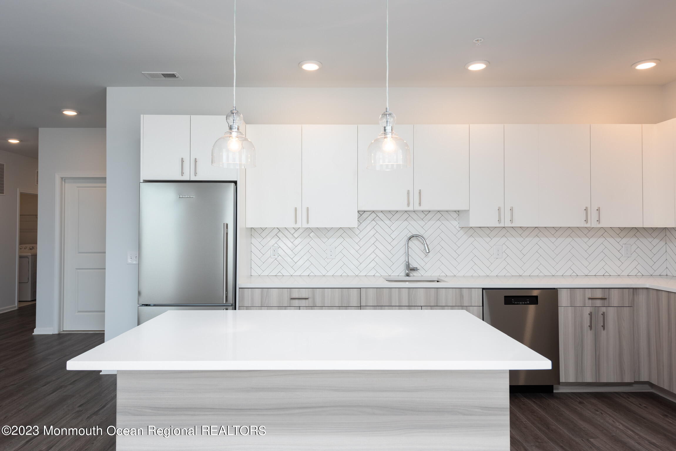 24 Mechanic Street, Unit 208 Red Bank, NJ 07701 - Photo 3 of 17 a bathroom with a bathtub and a sink