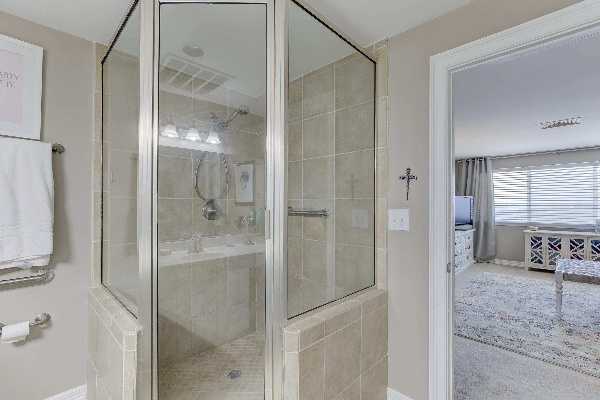 655 Riverside Drive, Unit 506B Memphis, TN 38103 - Photo 14 of 26 a bathroom with a shower and a sink