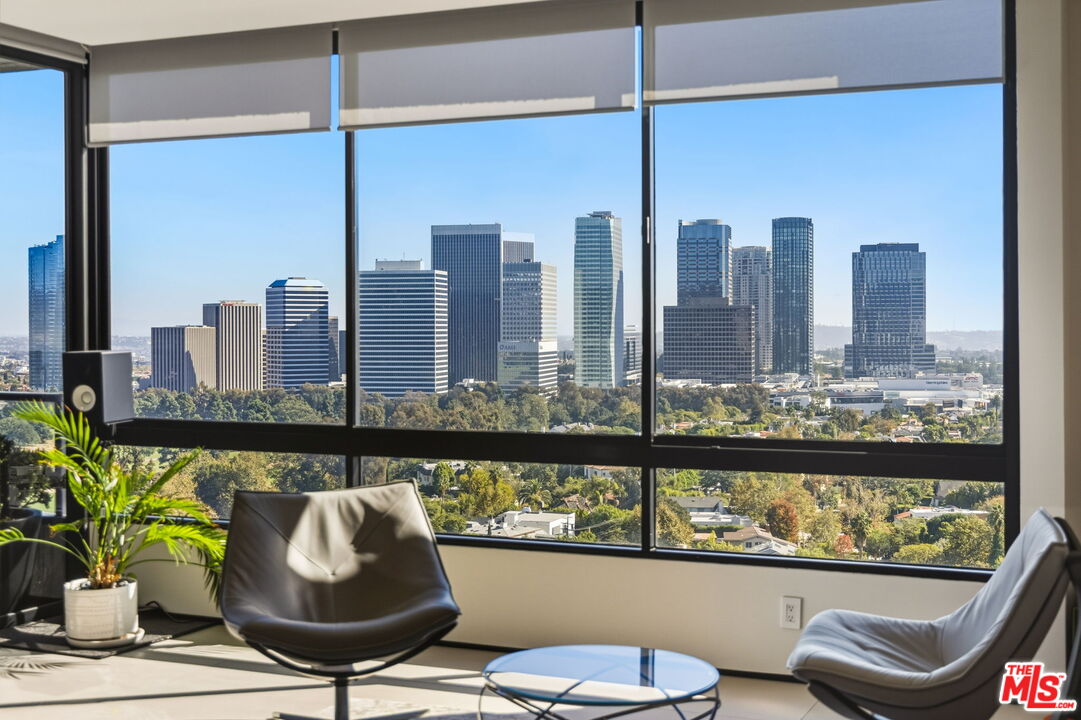 10350 Wilshire Boulevard, Unit 1203 Los Angeles, CA 90024 - Photo 11 of 69 a close view of dining table chairs and a potted plant