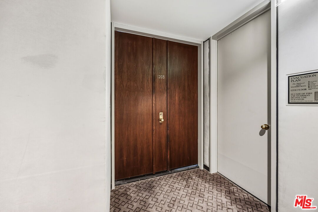 10350 Wilshire Boulevard, Unit 1203 Los Angeles, CA 90024 - Photo 2 of 69 a view of an entryway door