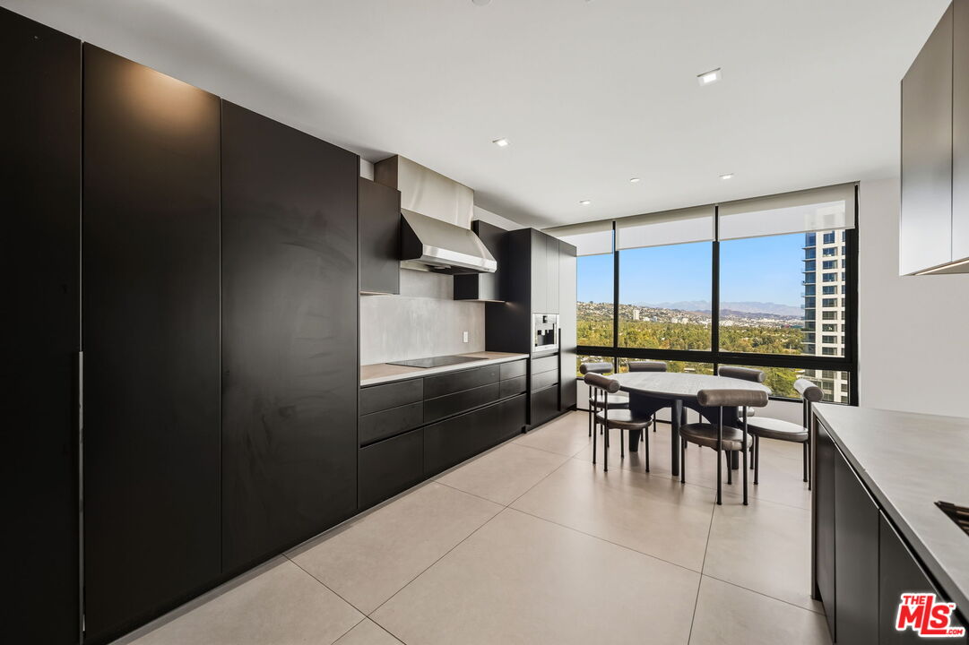 10350 Wilshire Boulevard, Unit 1203 Los Angeles, CA 90024 - Photo 24 of 69 a dining room with furniture