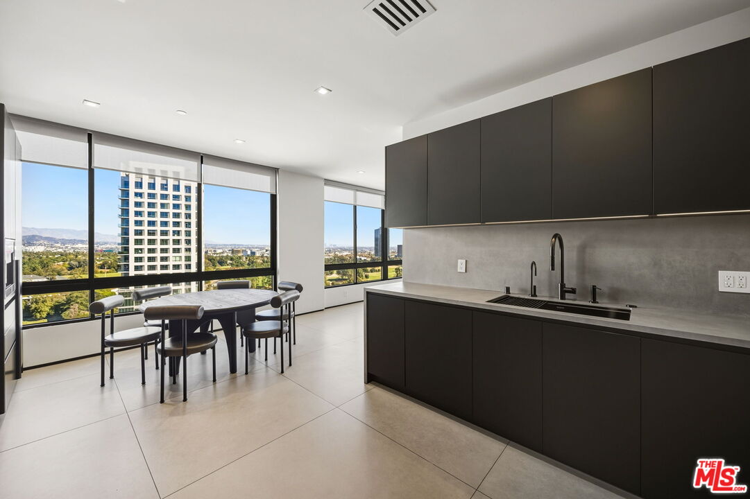 10350 Wilshire Boulevard, Unit 1203 Los Angeles, CA 90024 - Photo 25 of 69 a kitchen with lots of counter top space