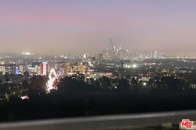 a view of a city with tall buildings