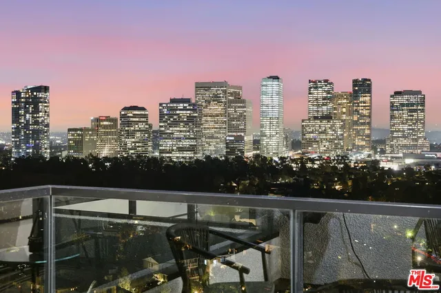 a view of a city with tall buildings