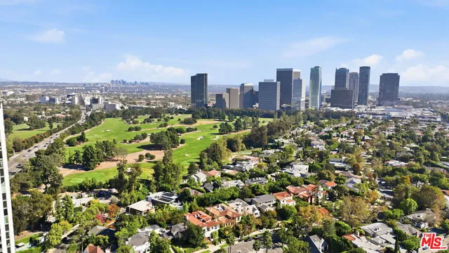 a sign that is on a brick wall