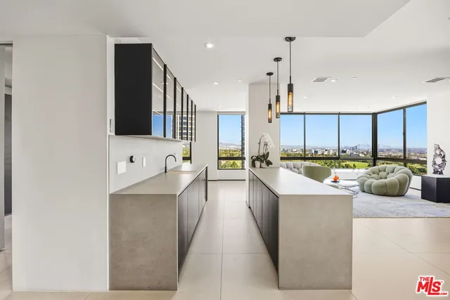 a view of kitchen dining table and chairs
