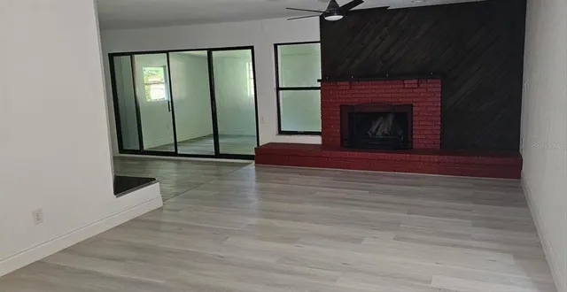a living room with a fireplace