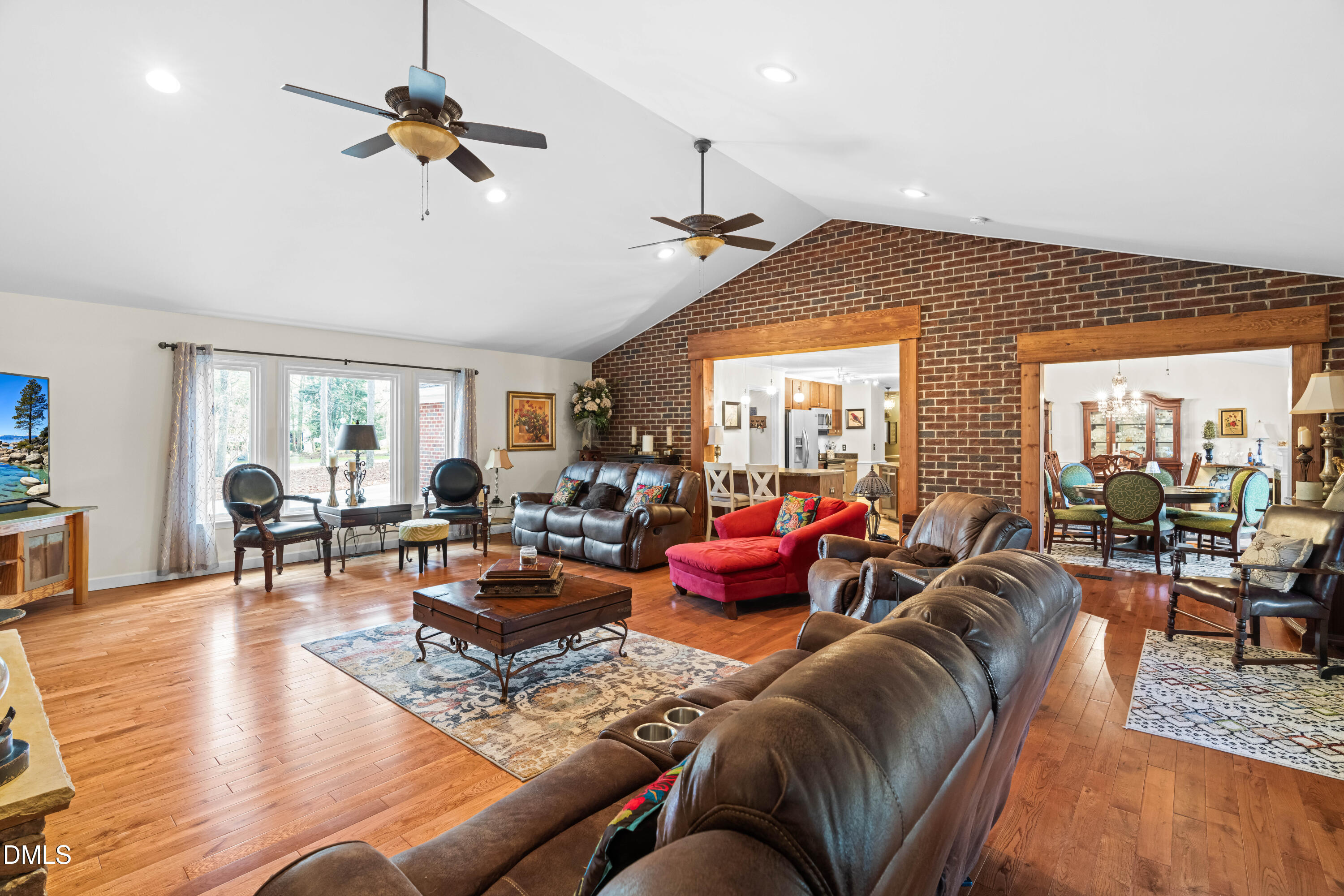 335 Sprunt Drive Clinton, NC 28328 - Photo 16 of 52 a living room with furniture kitchen view and a large window