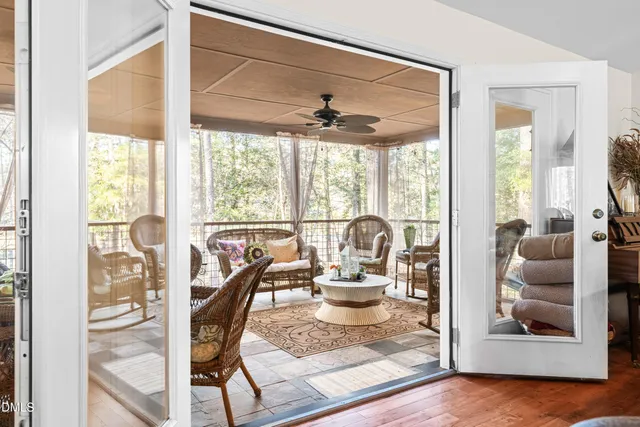 a view of a dining room with furniture window and outside view