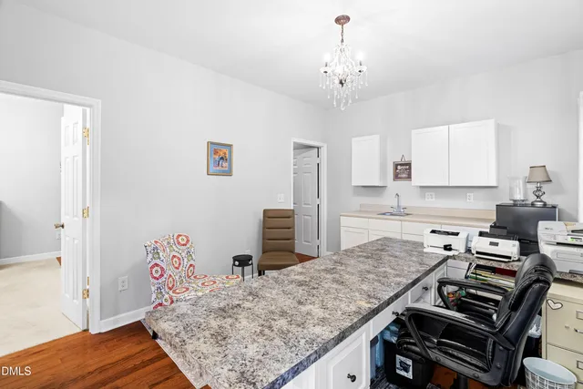 a view of a patio with couches and chairs