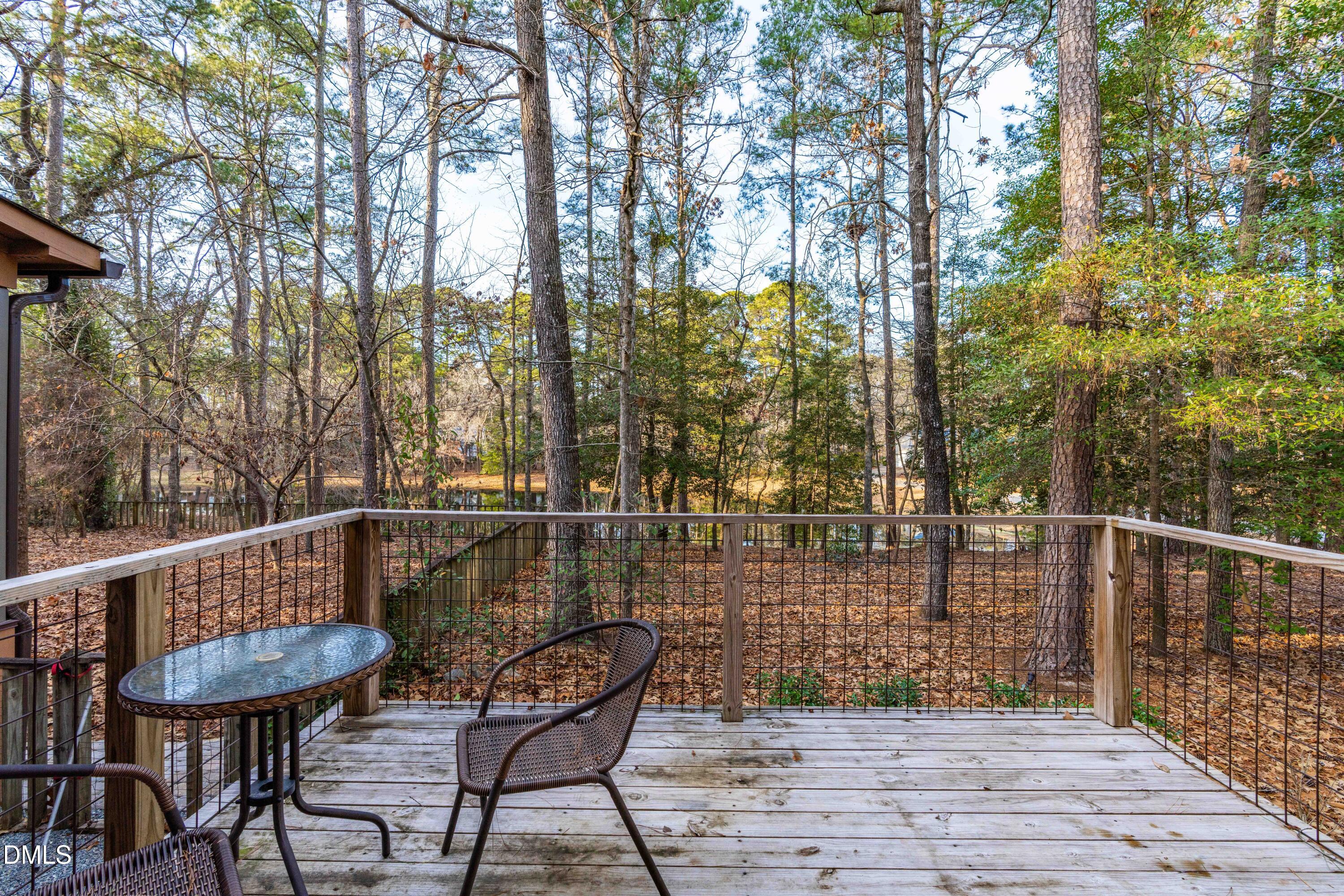 335 Sprunt Drive Clinton, NC 28328 - Photo 45 of 52 a view of a chairs and table on the deck