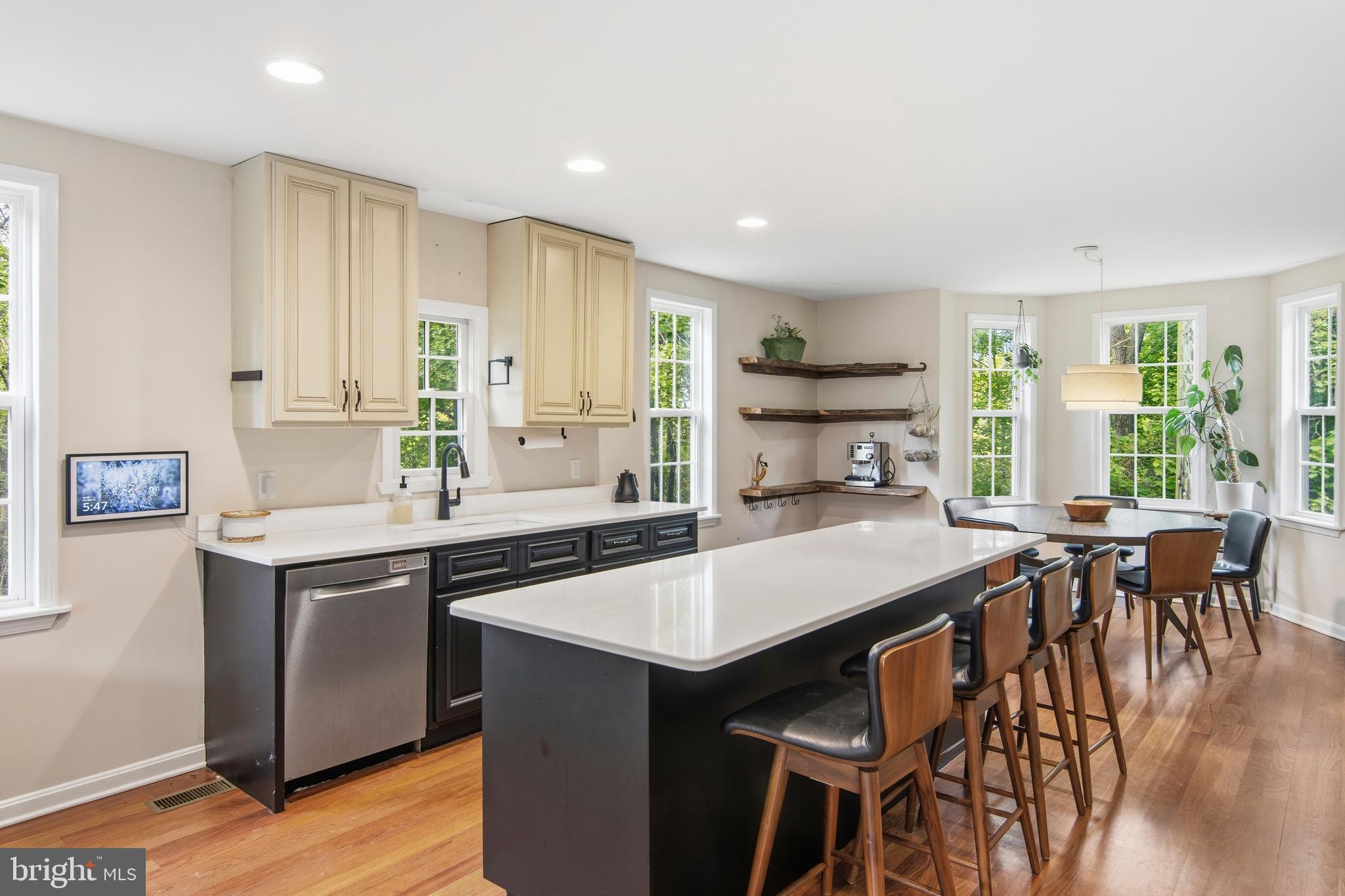 18708 York Road Parkton, MD 21120 - Photo 14 of 59 a kitchen with center island table and chairs in it