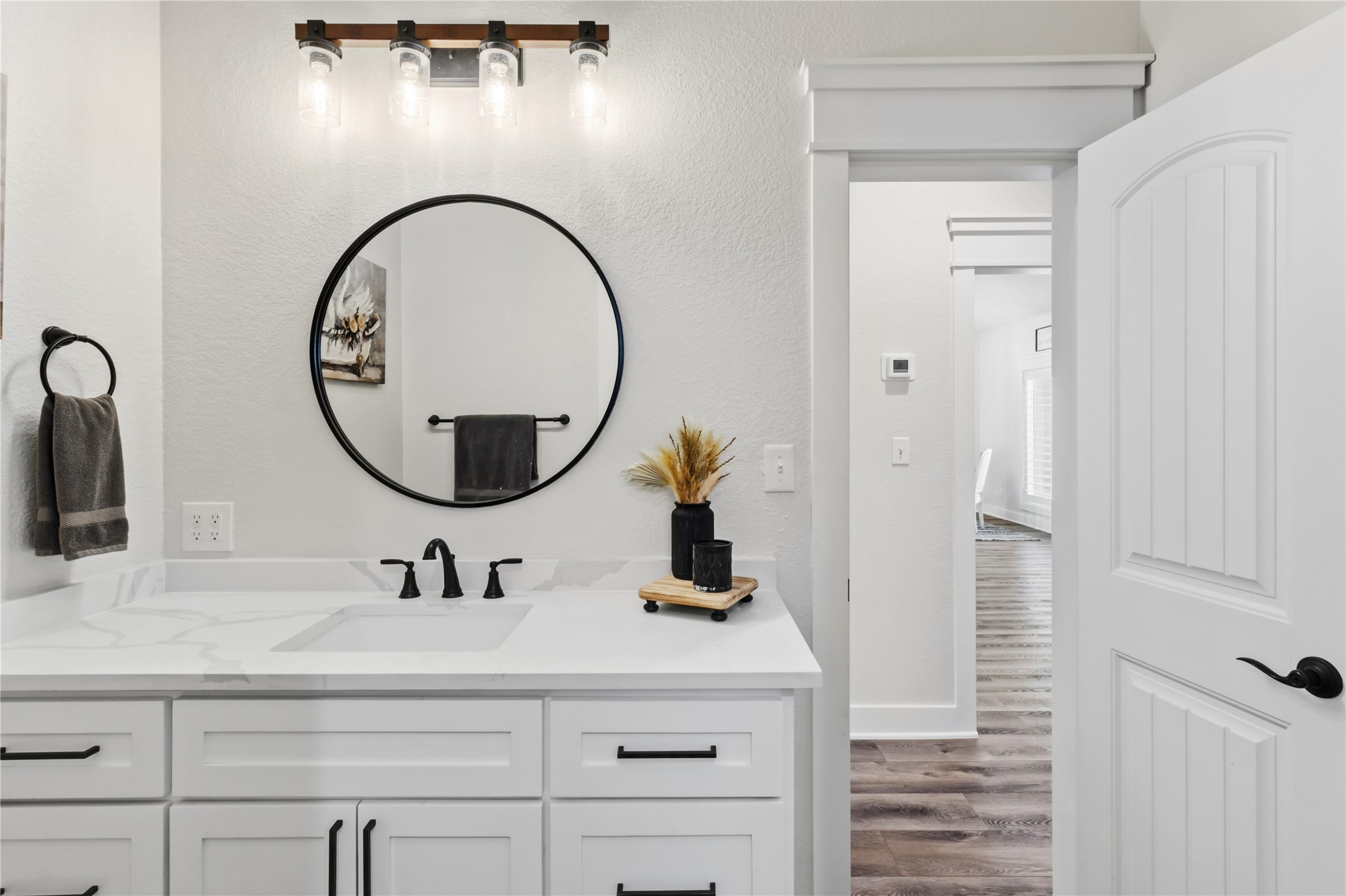 17637 Englin Road Winnie, TX 77665 - Photo 24 of 37 a bathroom with a sink and a mirror