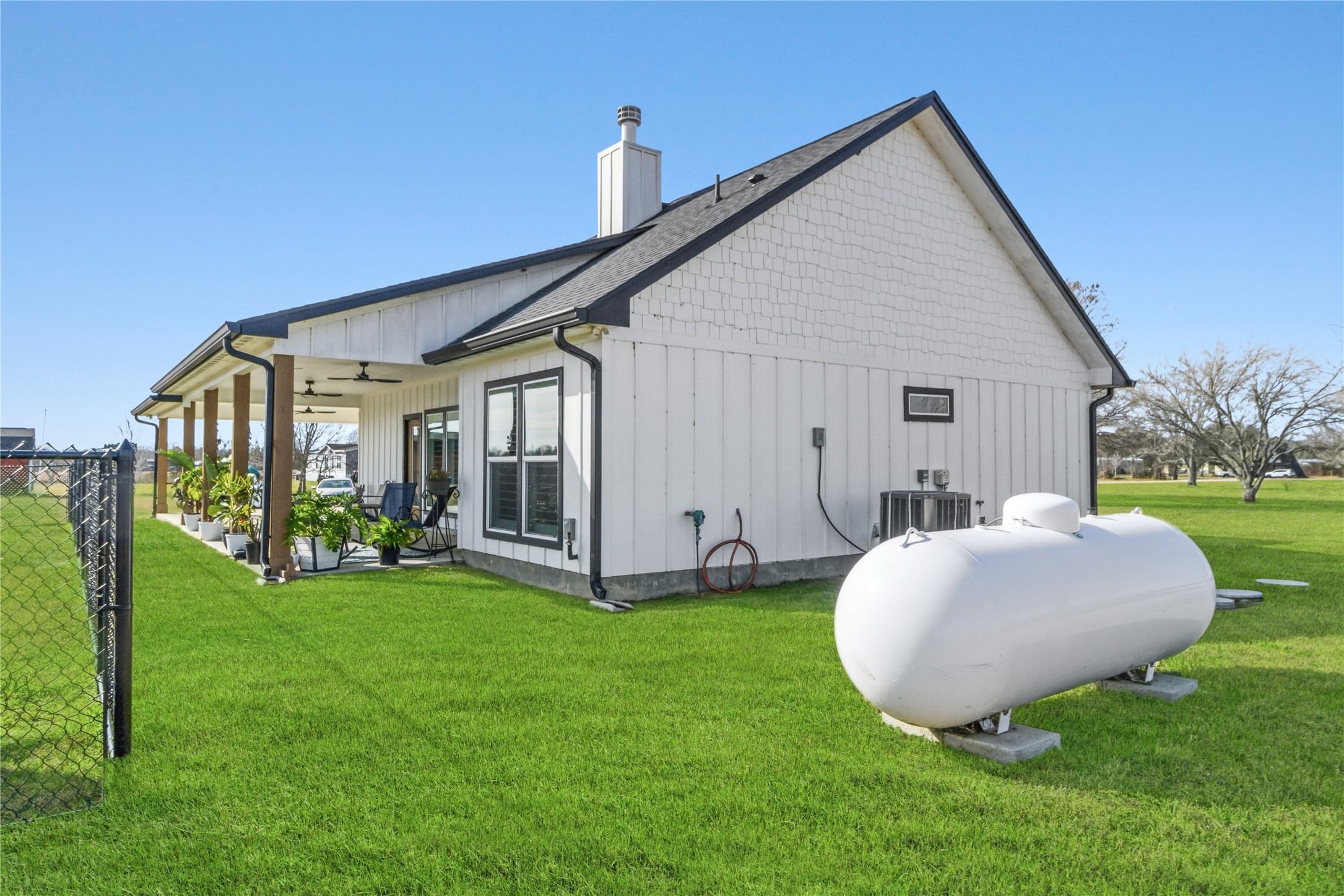 17637 Englin Road Winnie, TX 77665 - Photo 30 of 37 a view of a house with backyard and porch