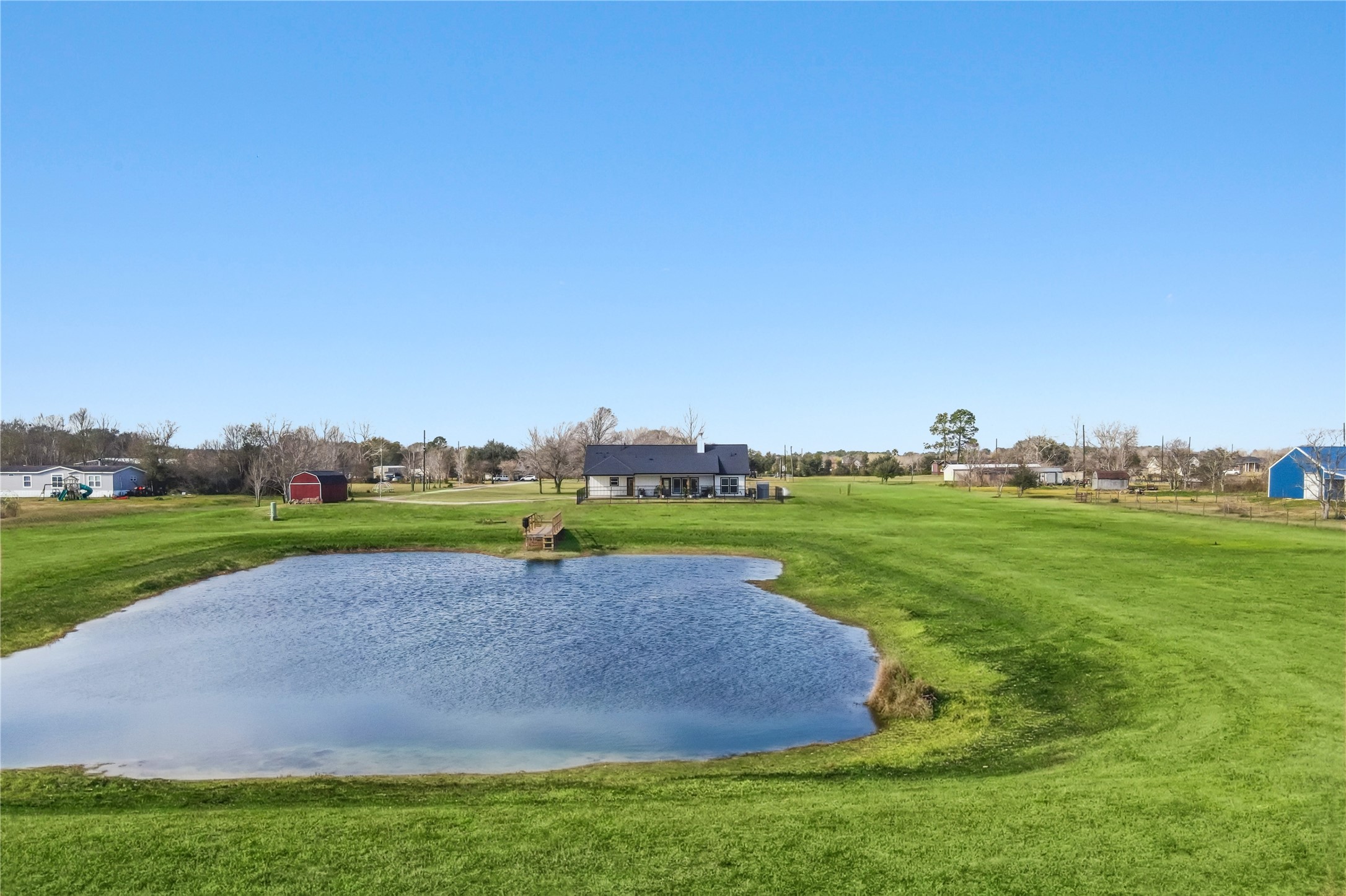17637 Englin Road Winnie, TX 77665 - Photo 33 of 37 a view of a golf course with a park