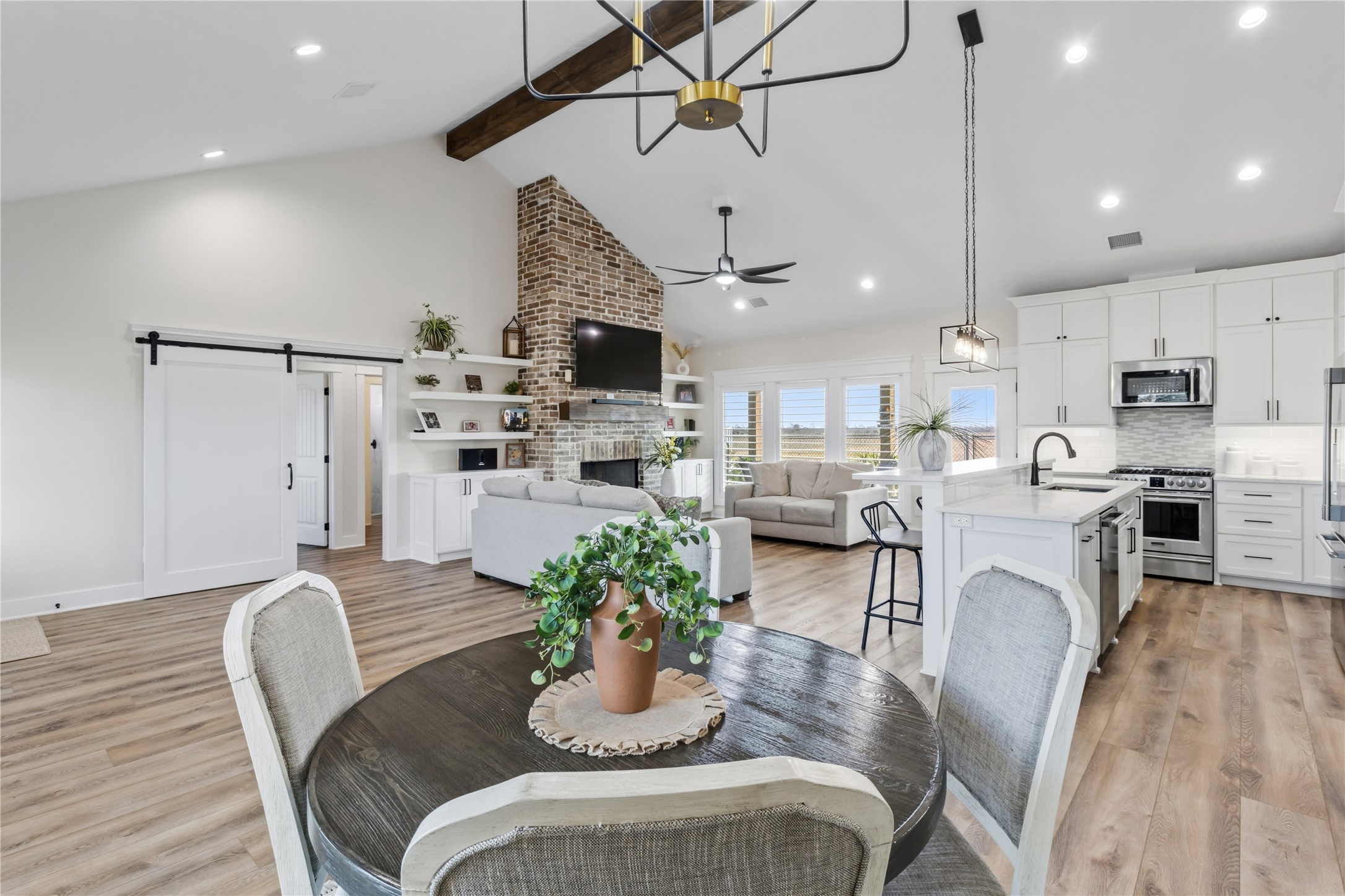 17637 Englin Road Winnie, TX 77665 - Photo 10 of 37 a living room with lots of furniture and kitchen view
