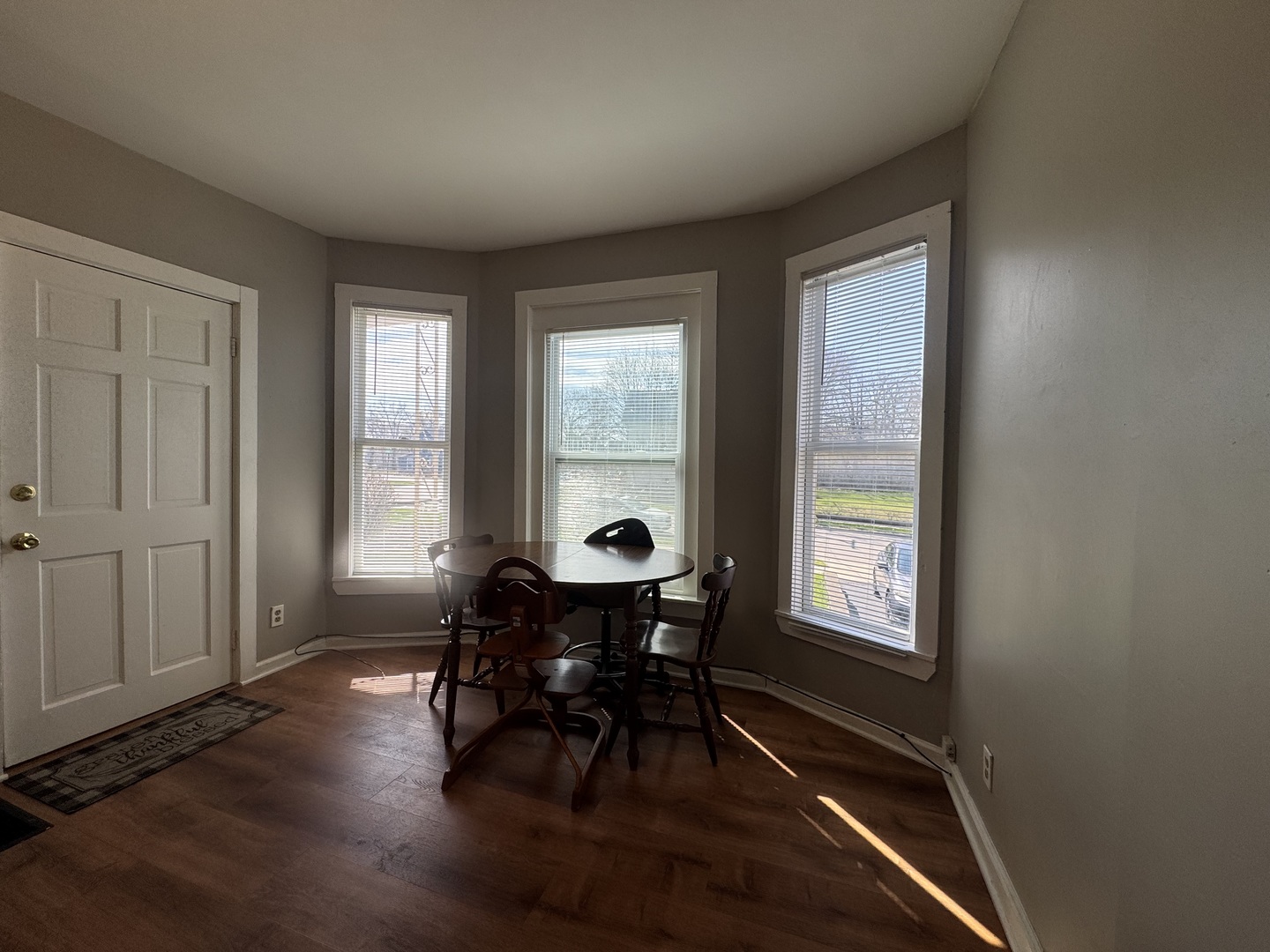 370 Bent Street, Unit 1 Elgin, IL 60120 - Photo 3 of 10 a view of a livingroom with furniture and window