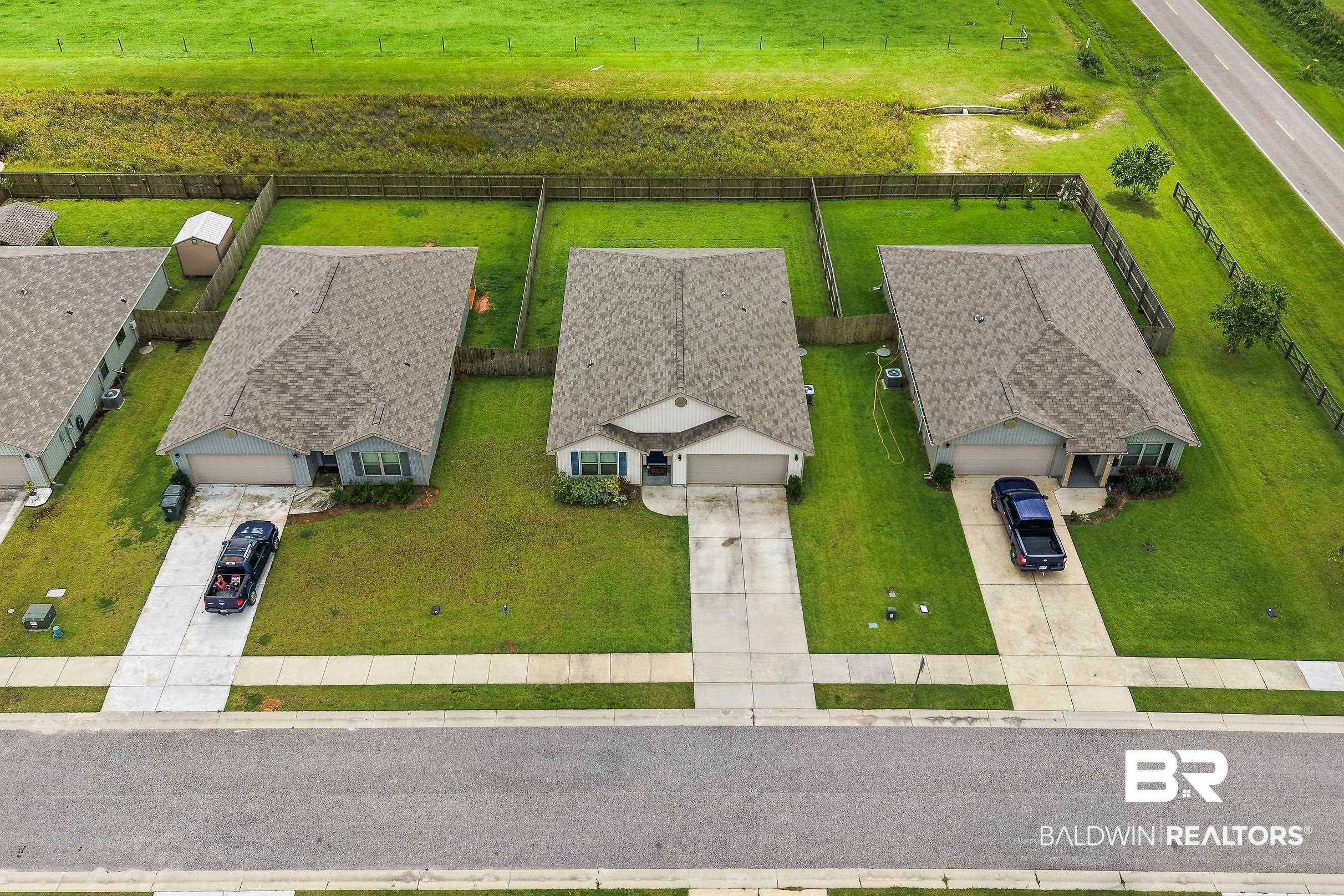 32030 Terranova Loop Lillian, AL 36549 - Photo 25 of 30 Single-story residence featuring a gray exterior and a shingled roof