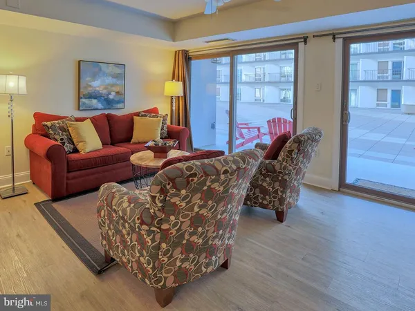 a living room with furniture and a table