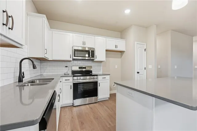 $337,852 | 12428 South Aspen Lane, Lee's Summit, MO 64086