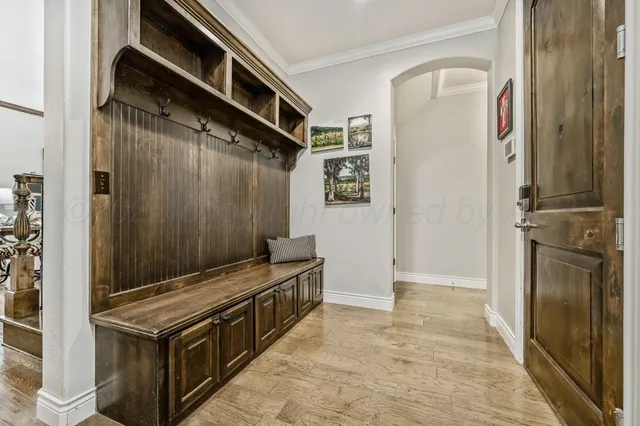 a kitchen with stainless steel appliances granite countertop a stove and a refrigerator