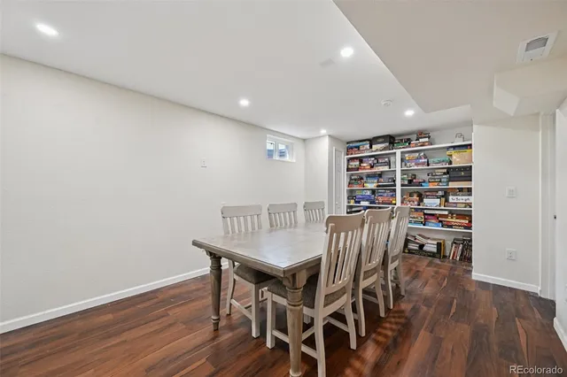 a front view of house with yard outdoor seating and barbeque oven