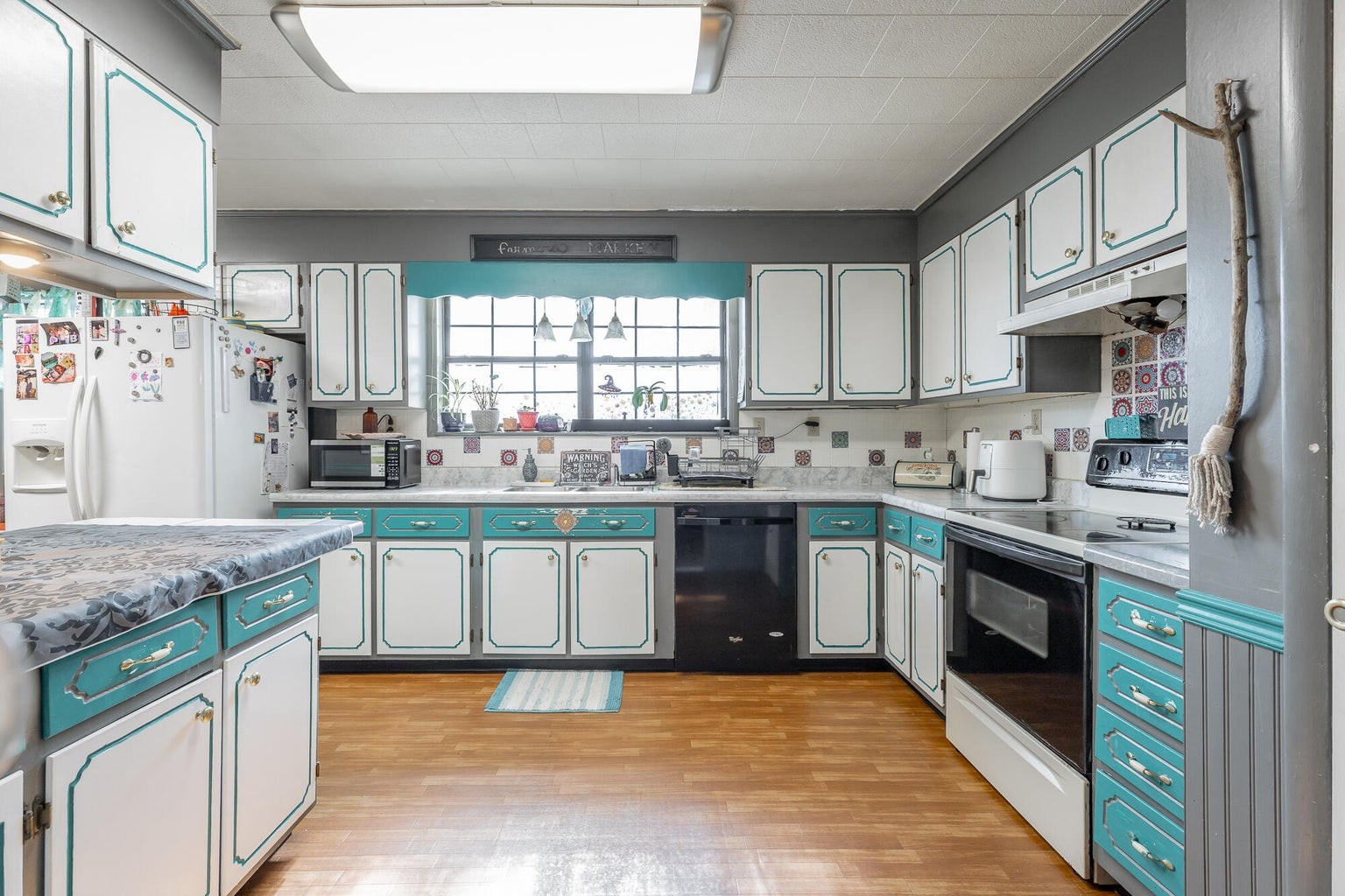 2582 East Valley Road Jasper, TN 37347 - Photo 17 of 17 a kitchen with stainless steel appliances granite countertop a stove a sink and a microwave