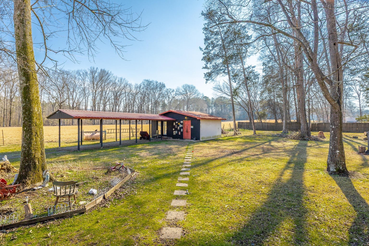 2582 East Valley Road Jasper, TN 37347 - Photo 2 of 17 a view of a swimming pool with an outdoor seating